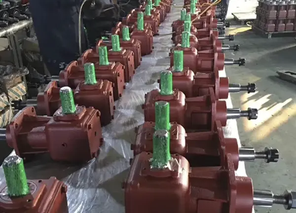 Factory row of rotary cutter gearboxes