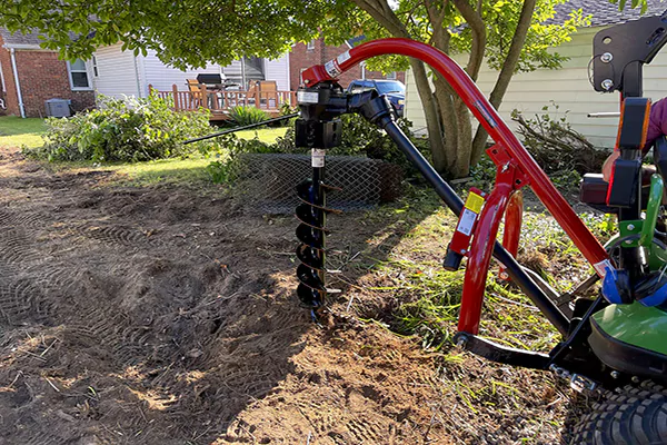 Tractor post hole digger gearbox used for fence installation and post setting in rural construction work