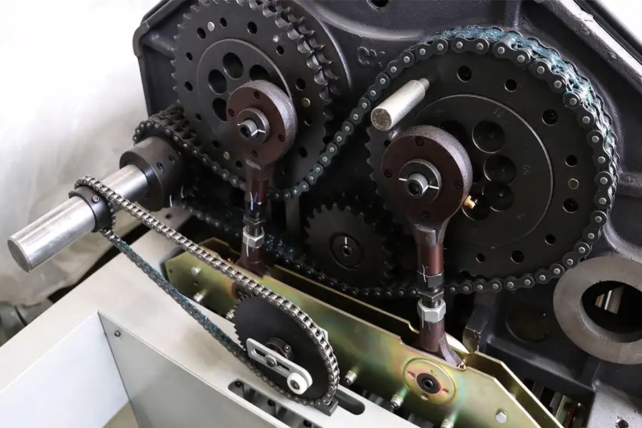 Jacquard loom chain drive and sprocket transmission system